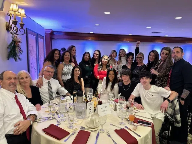 Madison Avenue Salons team together at a holiday dinner