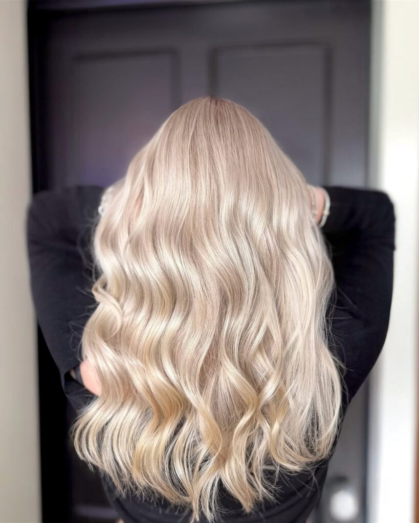 Lowlights with a root smudge by a colorist at Madison Avenue Salons.